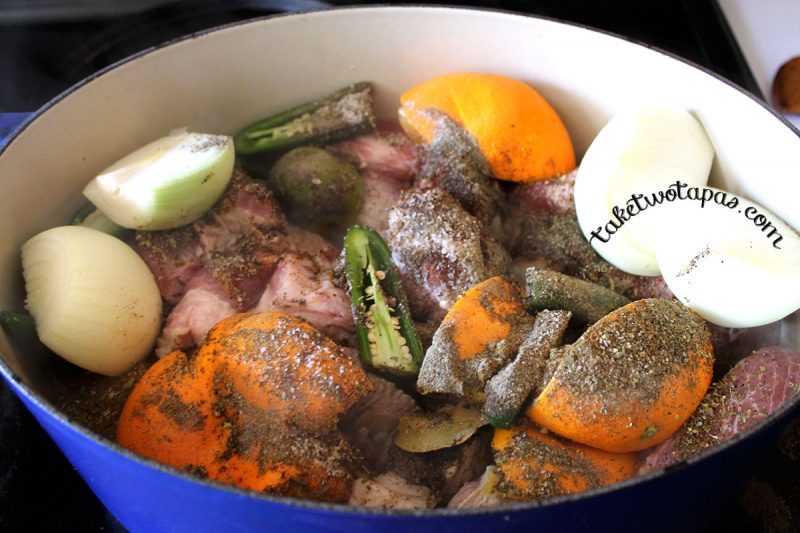 pork carnitas in a pot with spices