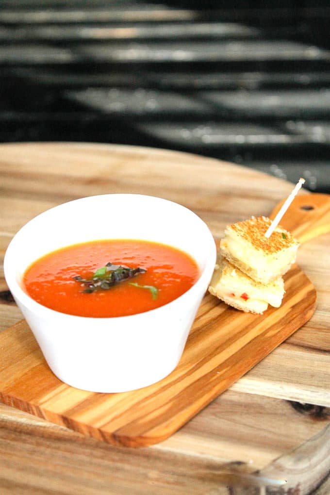 This simple 5 ingredient soup uses the grill so you can enjoy the outside and tomatoes from the garden or farmer's market. Summer Grilled Tomato Soup Recipe | Take Two Tapas | #Summer #GrillRecipes #TomatoSoupRecipe #GrilledTomatoes #TomatoRecipe #TomatoSoup