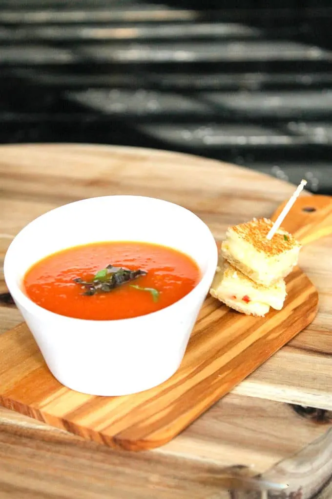 This simple 5 ingredient soup uses the grill so you can enjoy the outside and tomatoes from the garden or farmer's market. Summer Grilled Tomato Soup Recipe | Take Two Tapas | #Summer #GrillRecipes #TomatoSoupRecipe #GrilledTomatoes #TomatoRecipe #TomatoSoup