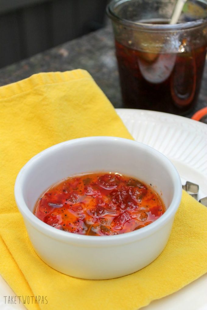 This sweet and spicy jelly is easy to whip up and can be used for chicken wings or on cheese and crackers! | Sweet and Spicy Four Pepper Jelly | Take Two Tapas | #Spicy #Jelly #Sauce #condiments