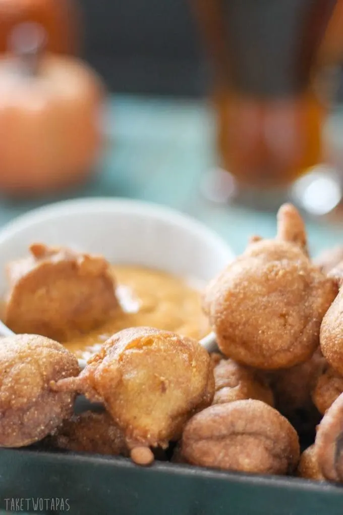 These spicy little andouille sausage corn dog bites are great dipped in mustard and accompanied by your favorite beverage. Great for Game Day! Andouille Corn Dog Bites Recipe | Take Two Tapas