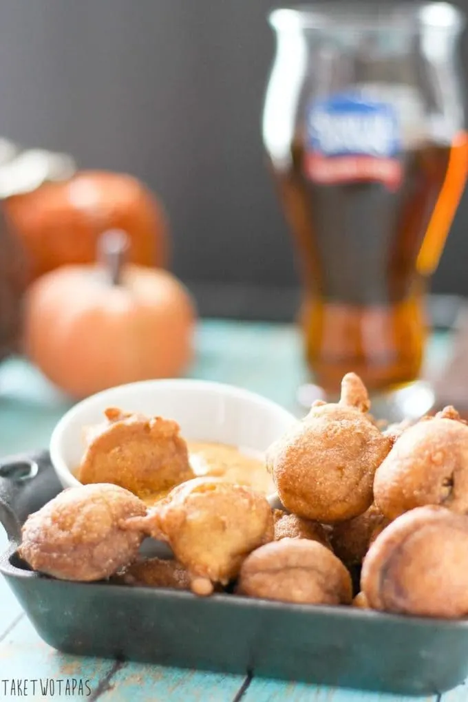These spicy little andouille sausage corn dog bites are great dipped in mustard and accompanied by your favorite beverage. Great for Game Day! Andouille Corn Dog Bites Recipe | Take Two Tapas