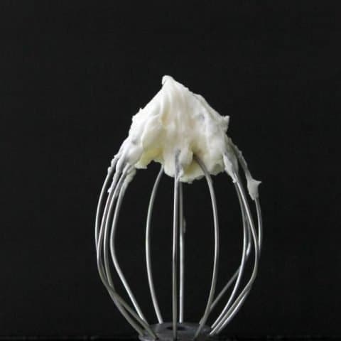 Classic Cream Cheese Frosting on a whsk