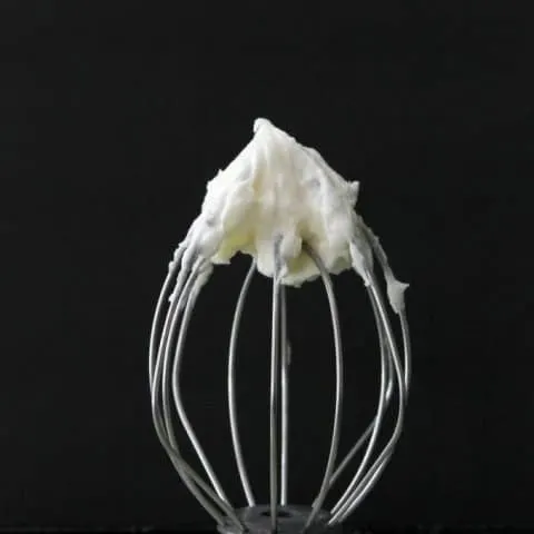 Classic Cream Cheese Frosting on a whsk