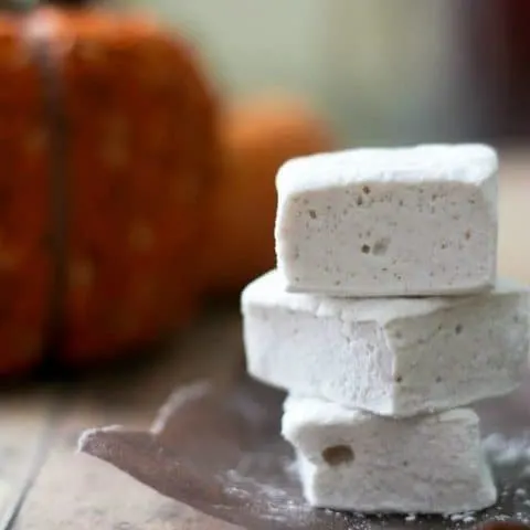 Side view of Pumpkin Pie Spice Marshmallows stacked on a napkin