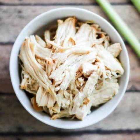 Overhead of lemongrass chicken in a white bowl