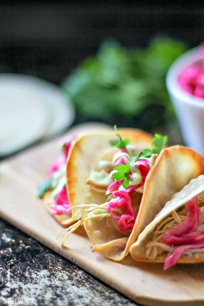 These non-traditional tacos are a great alternative to the usual tacos. Won Ton wrappers are the shell and filled with Lemongrass chicken, Pickled Red Cabbage, and a Cilantro Ginger Avocado Cream