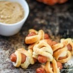 The perfect Halloween appetizer just got a smaller! Make the popular Mummy Dog into bite-sized snacks for kids of all ages! | Take Two Tapas | #HalloweenAppetizer #MummyPups