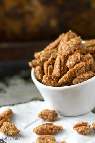 These crispy pecans are coated in brown sugar and the spices of a gingersnap cookie! Ginger, cinnamon, cloves, and a touch of molasses! These gluten-free pecans will make you think you are eating your favorite gingersnap cookies! Gingersnap Pecans Recipe | Take Two Tapas