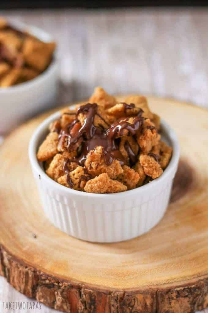 Crack Chex mix in a white bowl