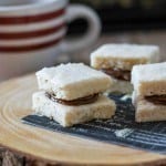 Soft buttery shortbread is elevated and made into a small sandwich cookie with the addition of chocolate caramel! This creamy and sweet chocolate caramel sauce is made int eh crock pot overnight and is the perfect addition to the shortbread cookie! Chocolate Caramel Shortbread Sandwich Cookie Recipe | Take Two Tapas