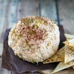 Mexican Cheese Ball with spicy tortilla chips. Looking for a spicy twist on a classic cheese ball? Try this one with with taco seasoning and green chilies. Make sure to eat it with toasty tortilla chips dusted with cumin and chili powder. Mexican Cheese Ball with tortilla chips recipe | Take Two Tapas