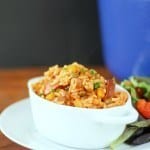 Need an easy, filling, one-pot meal that is ready in less than 30 minutes? I know as a working mom I need all the help I can get in the kitchen. This one-pot dish combines smoked sausage, pigeon peas, rice, and veggies with a hint of Bahamian flair! Smoked Sausage Peas and Rice Recipe | Take Two Tapas