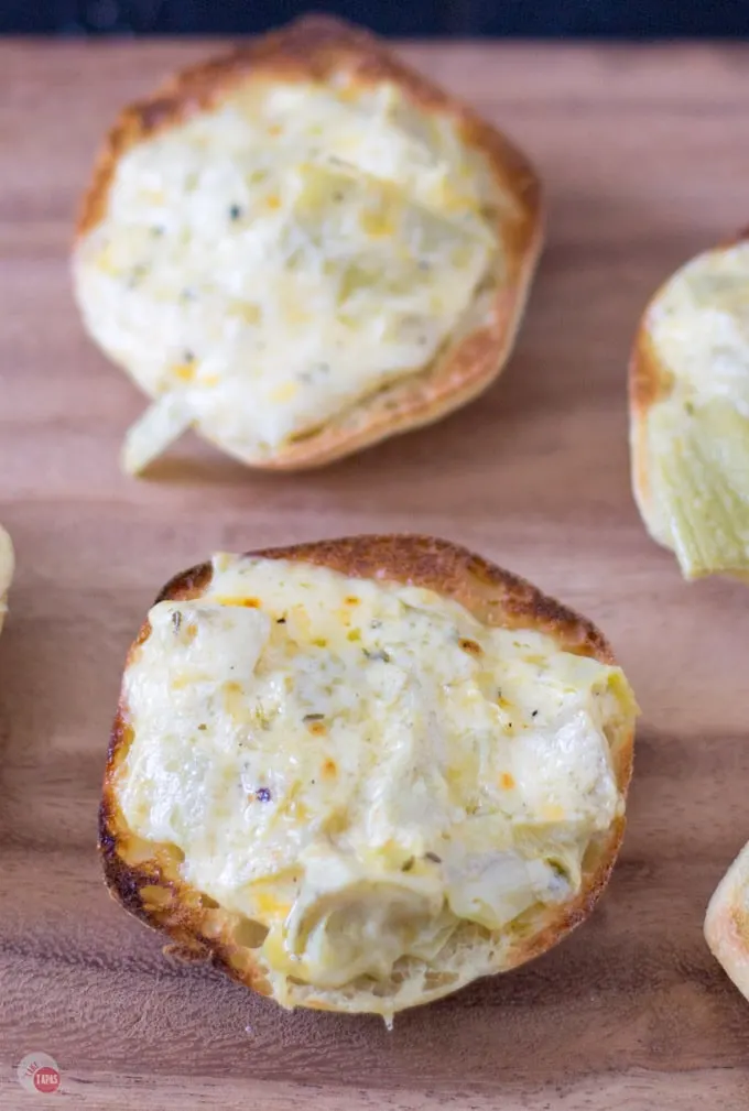 Close up of the cheesy goodness on the artichoke bread