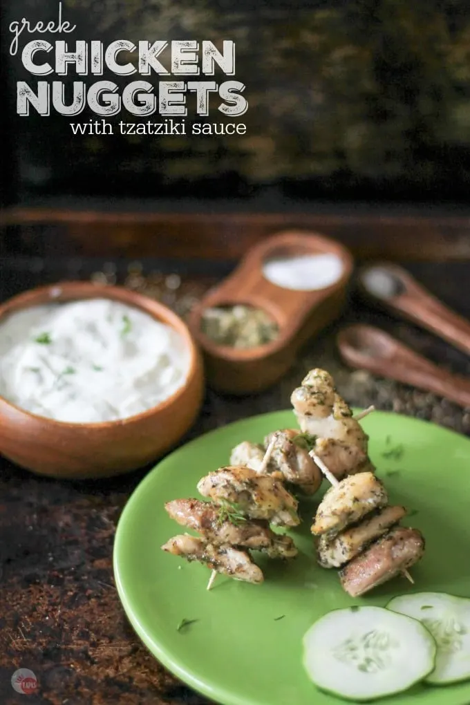 Greek Chicken Nuggets are dusted with homemade Greek Seasoning Mix, baked, and cooled off with Homemade Tzatziki Sauce. | Take Two Tapas | #GreekFood #GreekSeasoning #Chicken #ChickenNuggets #Skewers #EasyPartyFoods