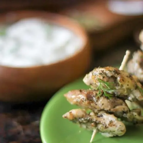 close up of Greek Chicken Nuggets on a green plate