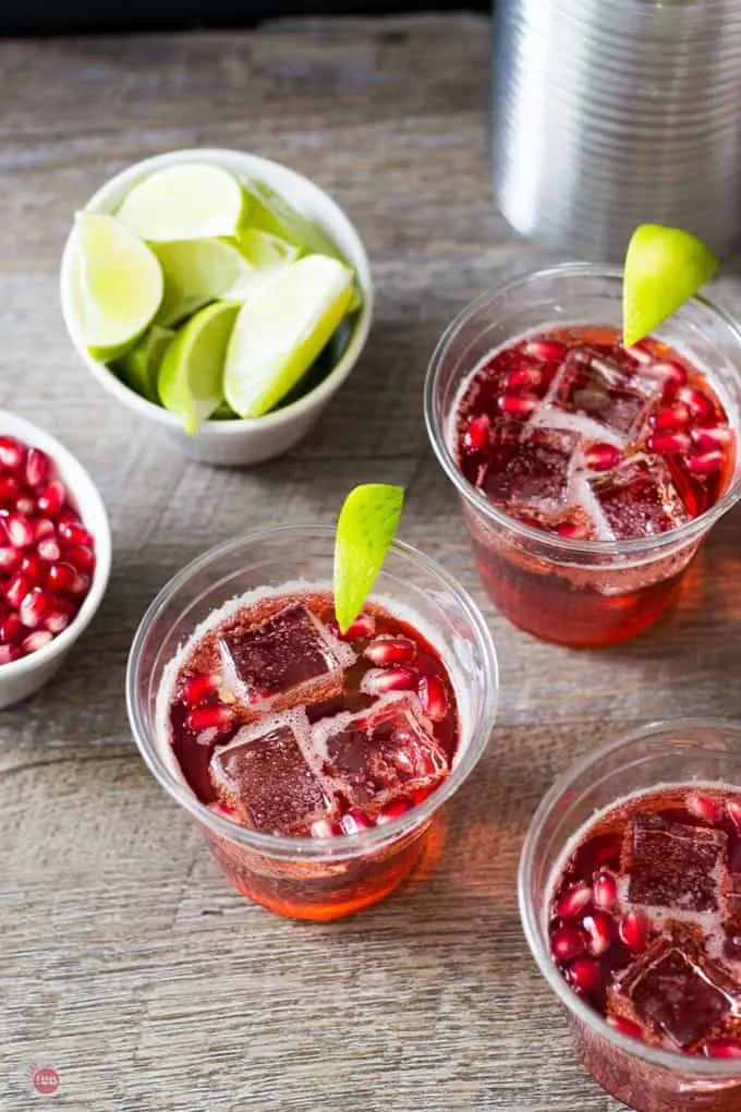 Overhead of cups filled with with pomegranate ginger ale sparkler