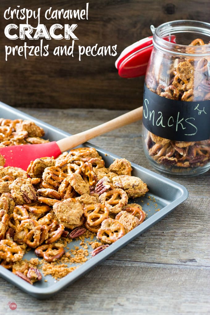 Crispy caramel crack pretzels on a sheet pan and in a glass jar with text "crispy caramel crack pretzels and pecans"
