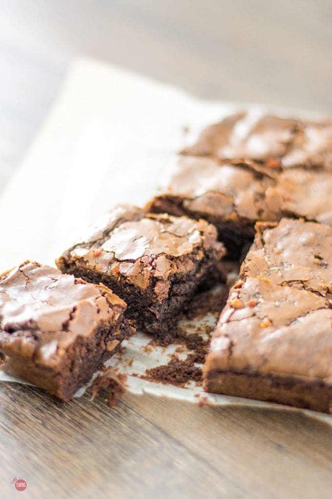 When you can't figure out what to eat when you are craving something sweet, salty, chocolate, AND has bacon in it, make a batch of my Bacon Salt Brownies! It hits all your cravings right in the mouth! Bacon Salt Brownies | Take Two Tapas | #BaconSalt #Bacon #Brownies #BaconSaltBrownies #BrownieRecipes