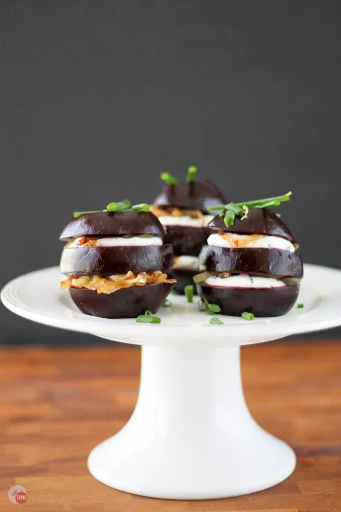 Assemble a gorgeous appetizer or salad course of pickled roasted beet napoleons with goat cheese and caramelized shallots. Make everything ahead of time and wow your guests when it's time to eat! Pickled Beet Napoleons Recipe | Take Two Tapas