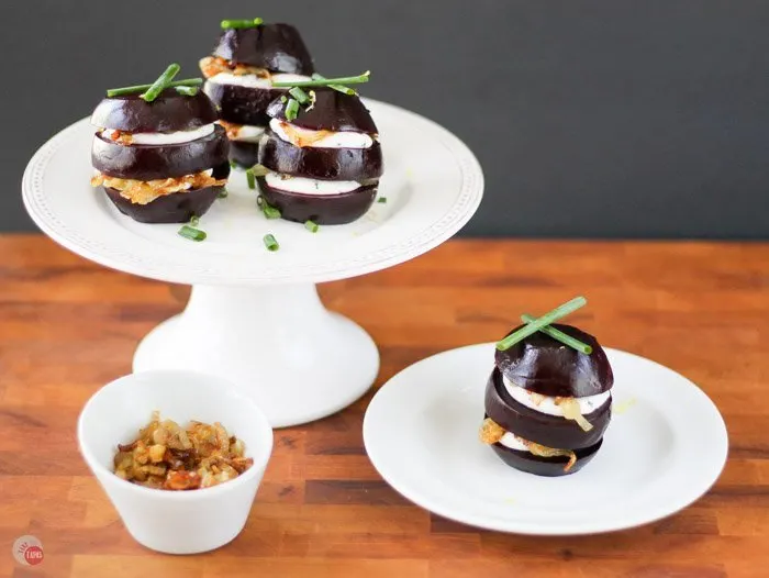 Assemble a gorgeous appetizer or salad course of pickled roasted beet napoleons with goat cheese and caramelized shallots. Make everything ahead of time and wow your guests when it's time to eat! Pickled Beet Napoleons Recipe | Take Two Tapas