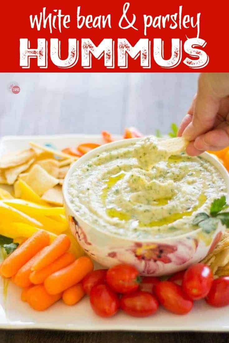 Pinterest image of hummus with text " white bean & parsley hummus"