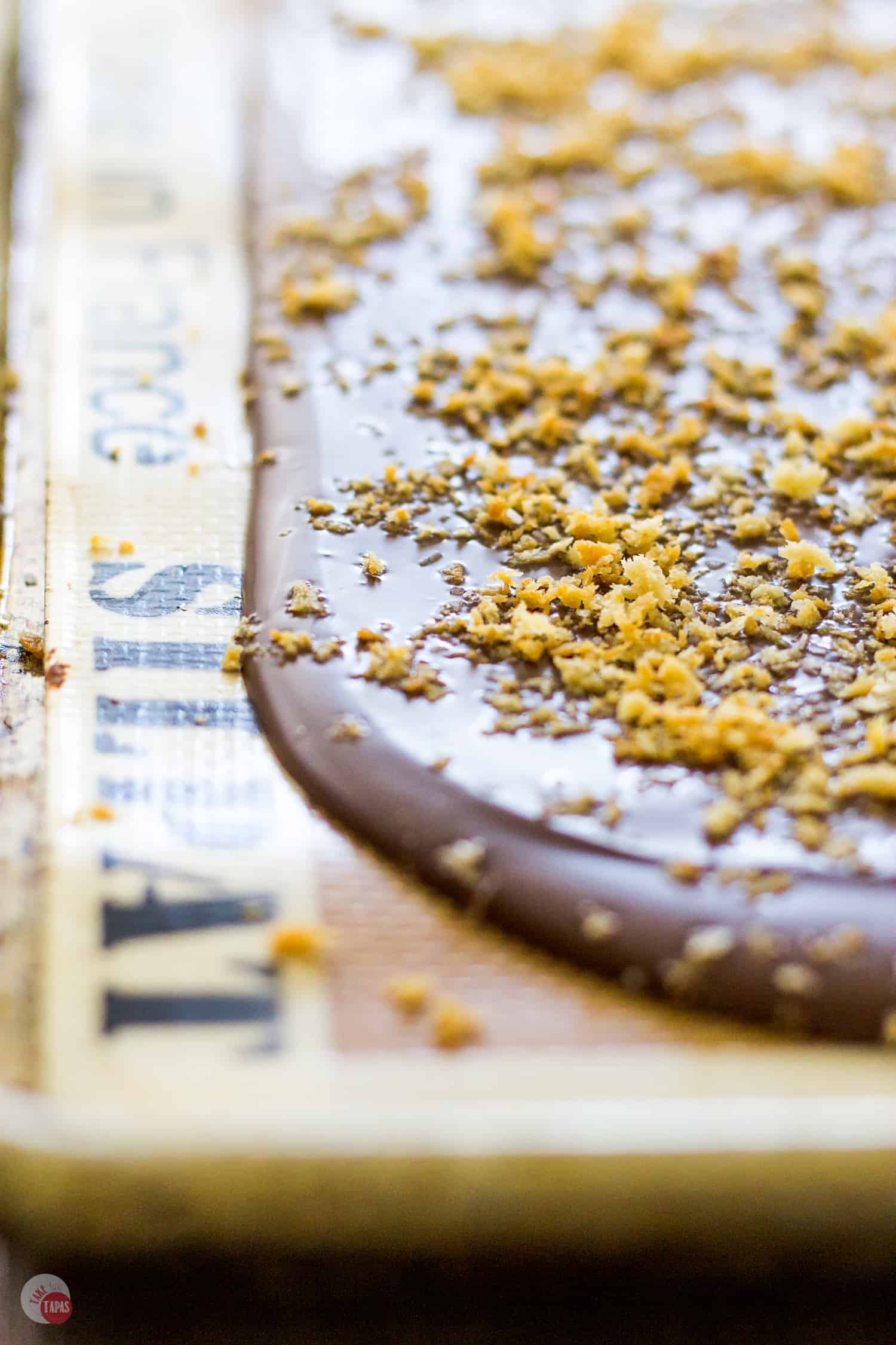 Buttery Dark Chocolate Bark with Panko Crumbs on a silicone lined sheet pan