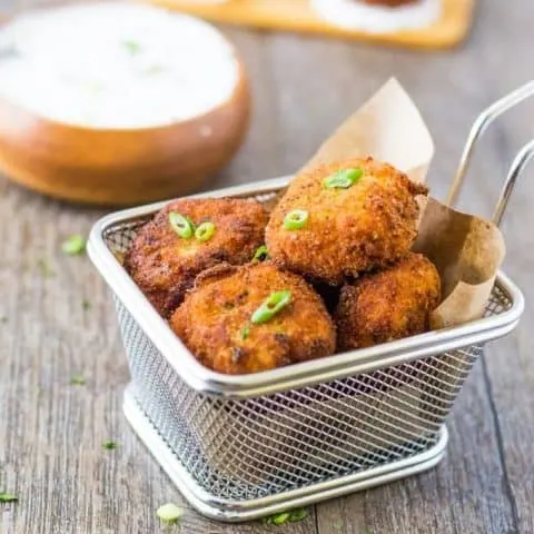 Southwest potato croquettes on a paper lined fry basket