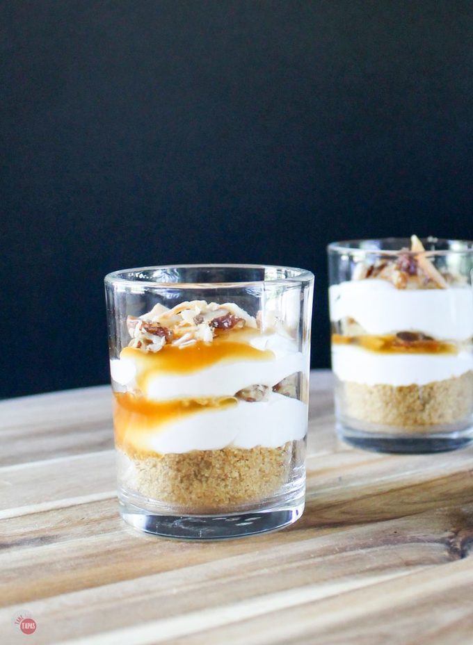 These Cream Caramel Shooters are filled with fluffy cream cheese, whipped topping, caramel sauce, and toasted coconut! Make these ahead of time and wow you party guests!