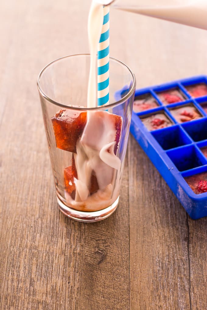 Pour your milk slowly over your Dr Pepper Ice Cubes | Take Two Tapas