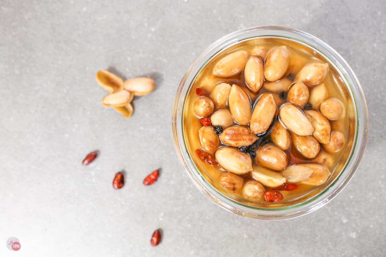 overhead picture of pickled peanuts in a jar