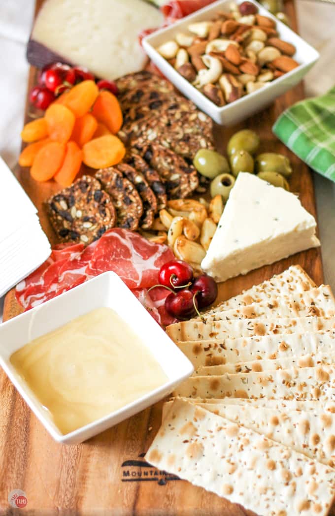 Graze on a Summer Tapas Antipasto Cheese Board | Take Two Tapas | #SummerEntertaining #EasyEntertaining #CheeseBoardIdeas #CheeseBoardDisplay #Antipasto #Tapas #CheeseBoard