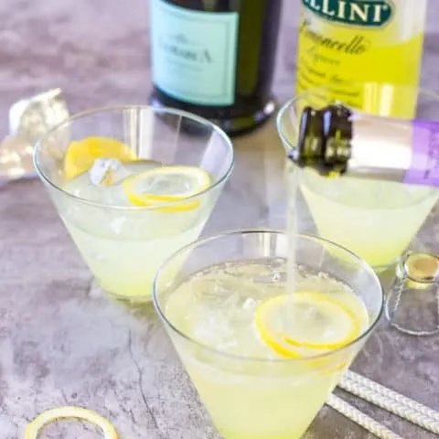 Prosecco being poured in to the Limoncello.
