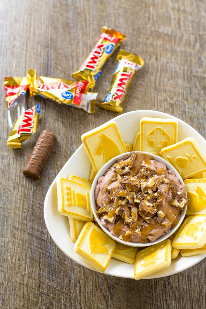 over head shot of decadent chocolate caramel twix dip