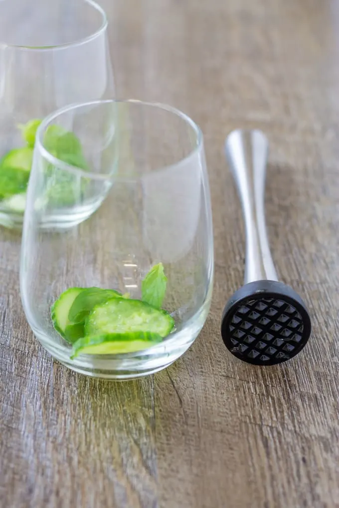 This Cucumber Mint Gin Cooler has two garnishes! | Take Two Tapas | #Cucumber #Gin #Mint #SummerCocktail #SparklingWater #EasyCocktail #SummerEntertaining