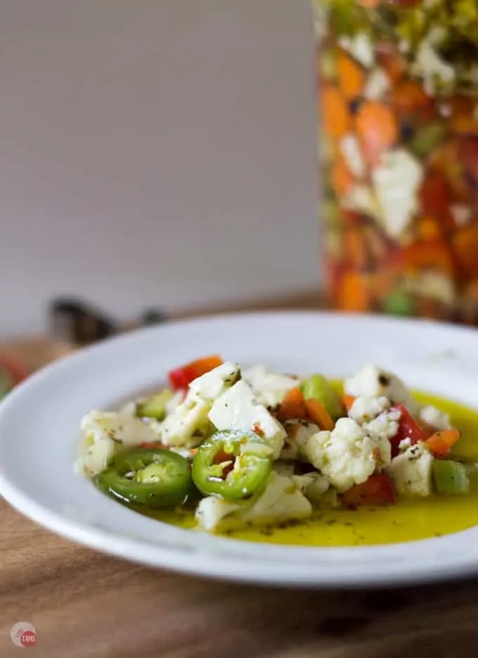 Close up of Giardiniera pickled vegetable relish on a white plate