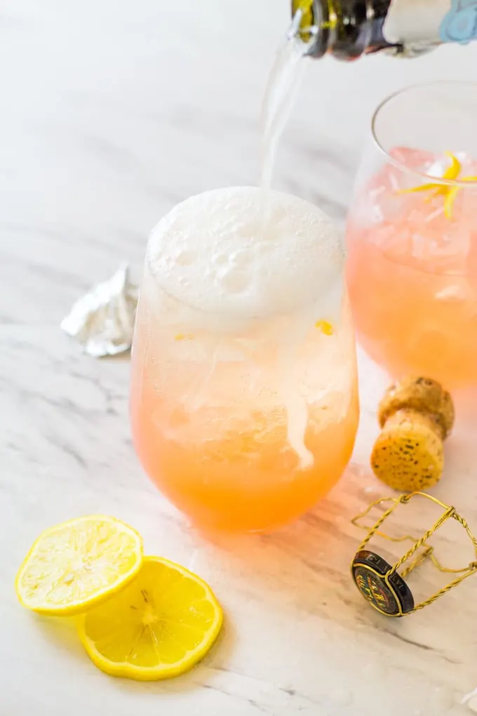 Add the prosecco to the Grapefruit Lemonade Crush | Take Two Tapas | #Grapefruit #Lemonade #CocktailRecipe #3IngredientCocktail #EntertainingRecipes