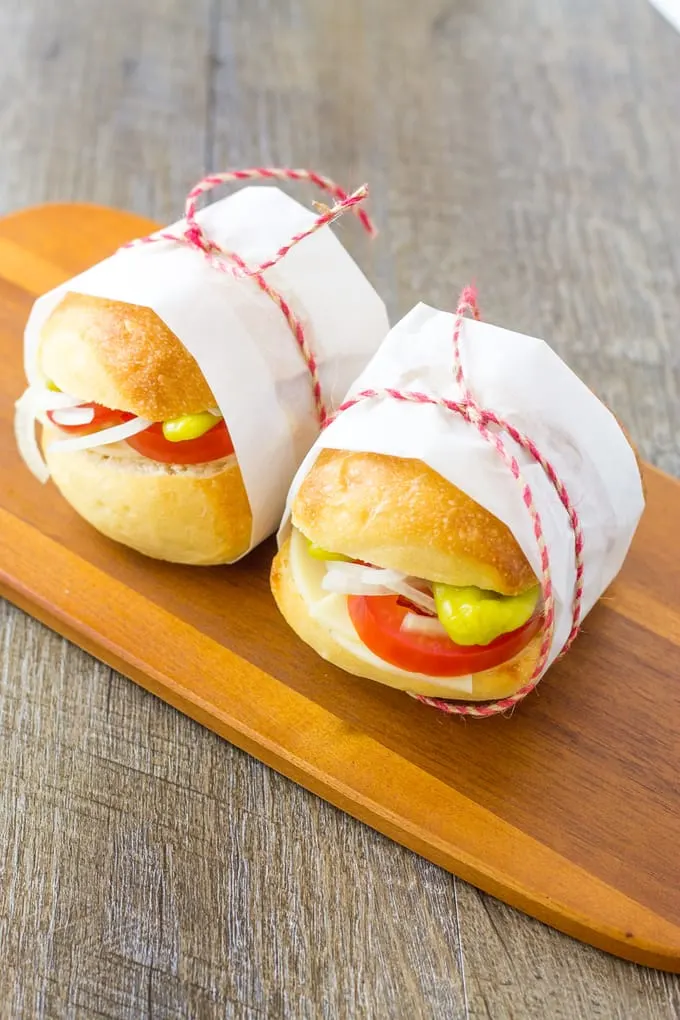 They may be small but they are mighty! These Mini Veggie Italian Sliders will satisfy you! | Take Two Tapas | #VegetarianSliders #PicnicSandwiches #PicnicIdeas #VeggieSandwiches #VegetarianSubs