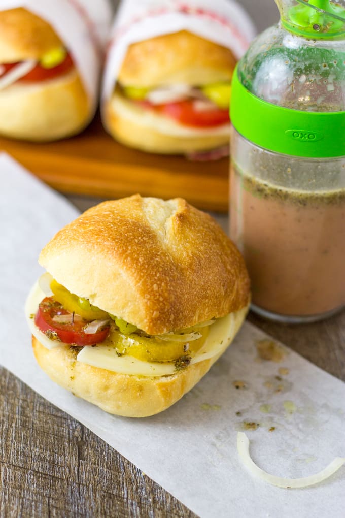 All the antipasto veggies are present in my Mini Veggie Italian Sliders | Take Two Tapas | #VegetarianSliders #PicnicSandwiches #PicnicIdeas #VeggieSandwiches #VegetarianSubs