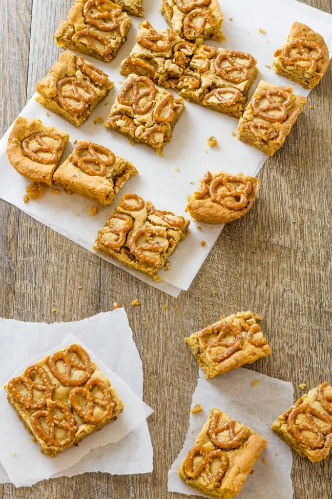 All the texture in these peanut butter pretzel bars is off the chain. Not to mention the bacon and the bourbon! | Take Two Tapas | #PeanutButter #Pretzels #PeanutButterBars #BrownieRecipe #Bacon #PeanutButterRecipes