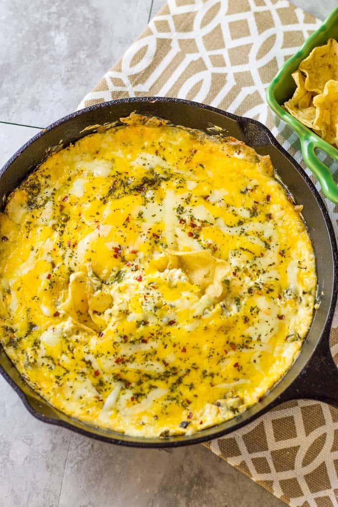 My Poblano Popper Skillet Dip is a new twist on the classic jalapeño popper dip with a smoky kick! | Poblano Popper Skillet Dip | Take Two Tapas | #SkilletDip #PoblanoPopper #JalapeñoPopper #TailgatingDip #MakeAheadTailgatingFood