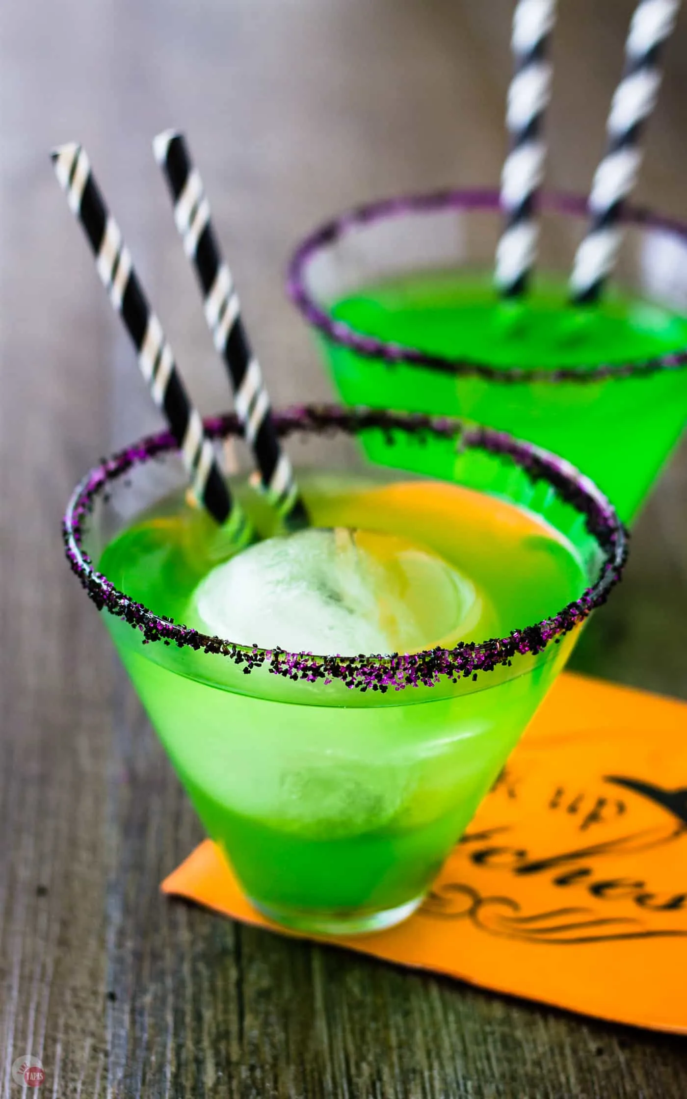 The bright green color of my Flying Monkeys Cocktail is perfect for celebrating Halloween with friends | Take Two Tapas