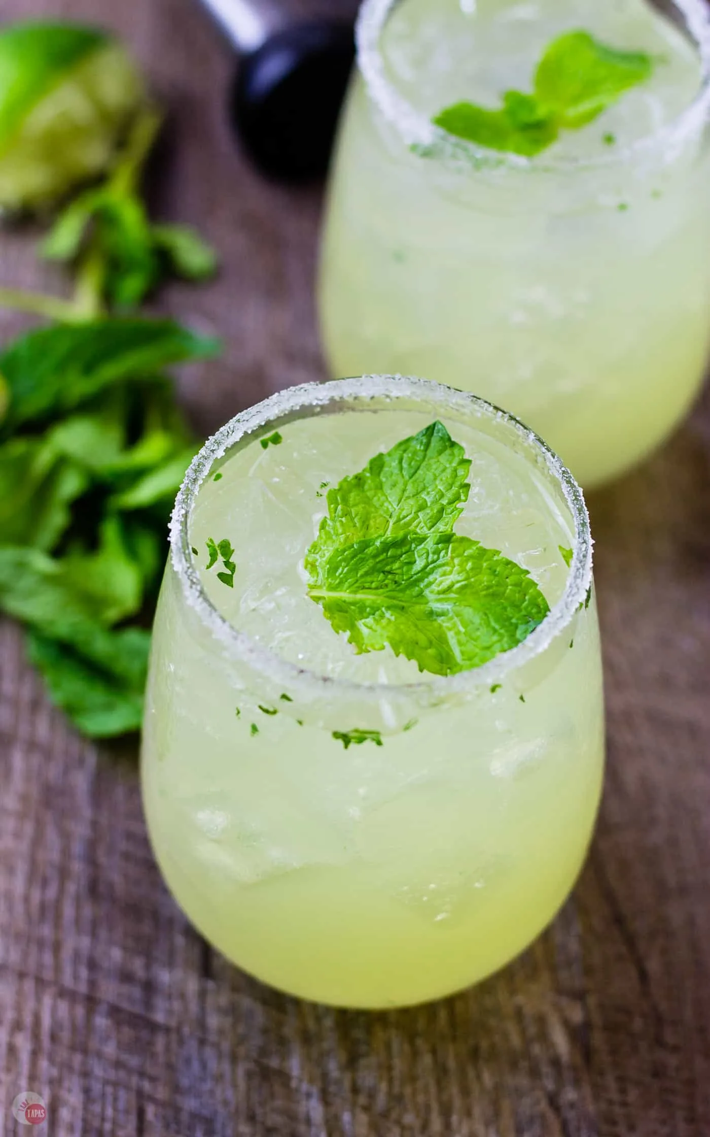 The gorgeous colors of green and yellow are highlighted with the mint leaves in my Mariachi Mash | Take Two Tapas | #Limoncello #Lime #Tequila #Cocktails #SummerEntertaining #EasyCocktails