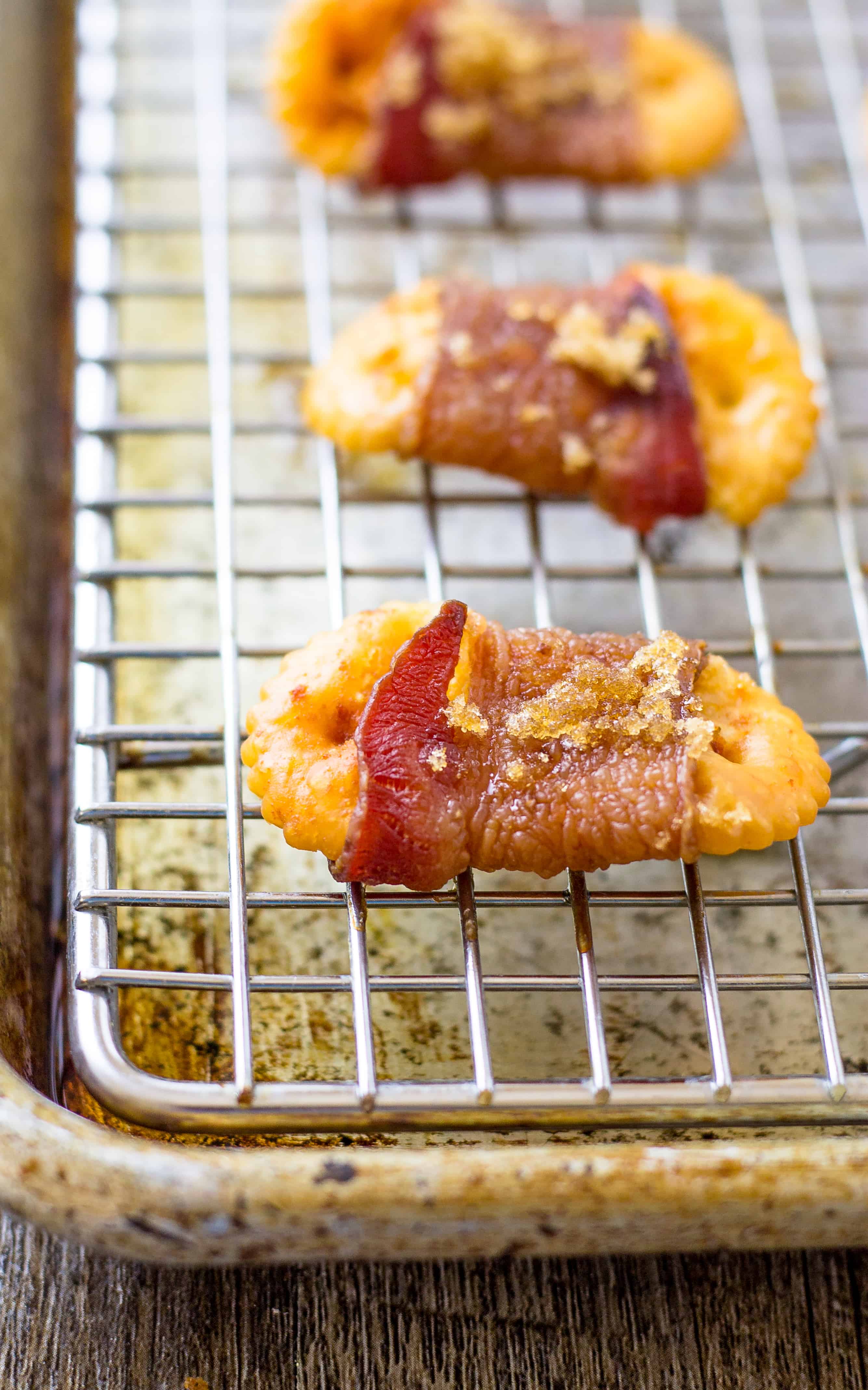 up close of Sweet and Spicy Bacon Crackers on a sheet pan rack