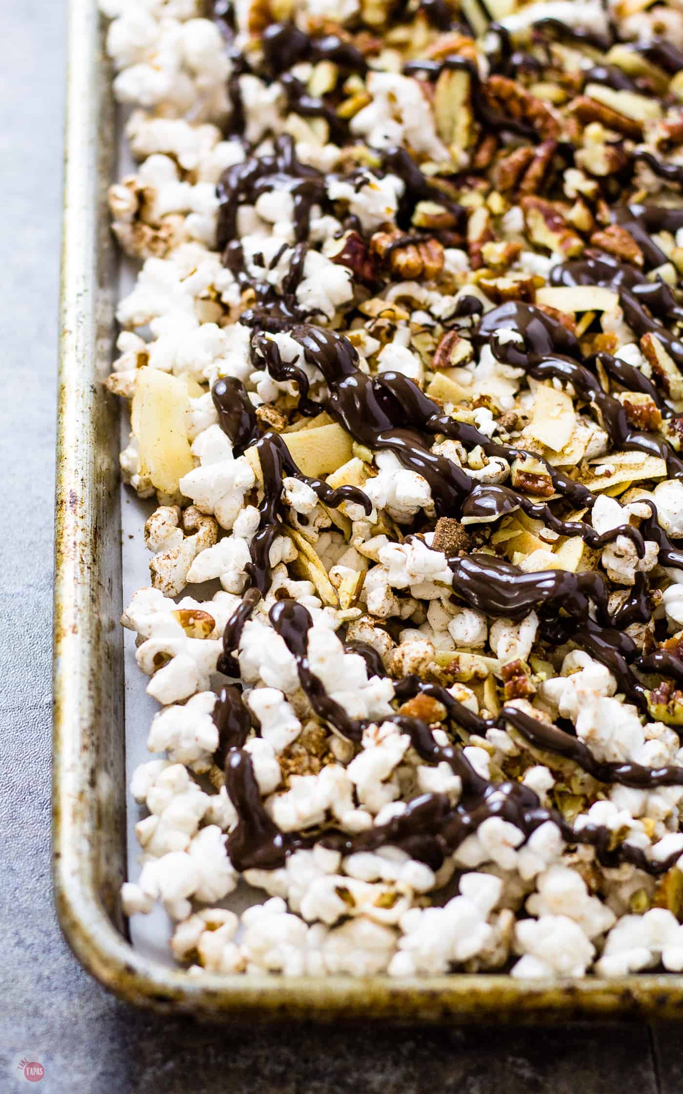 Caramel, chocolate, coconut, pecans, and popcorn make up this delicious German Chocolate Popcorn | Take Two Tapas