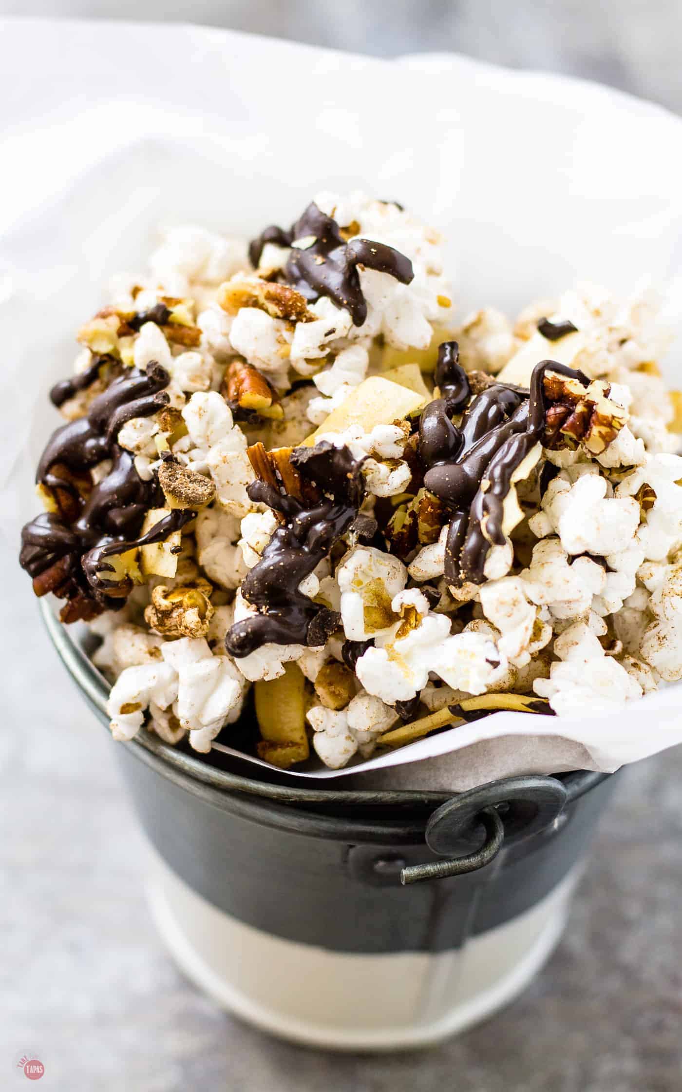 overhead of German Chocolate Popcorn in a bucket