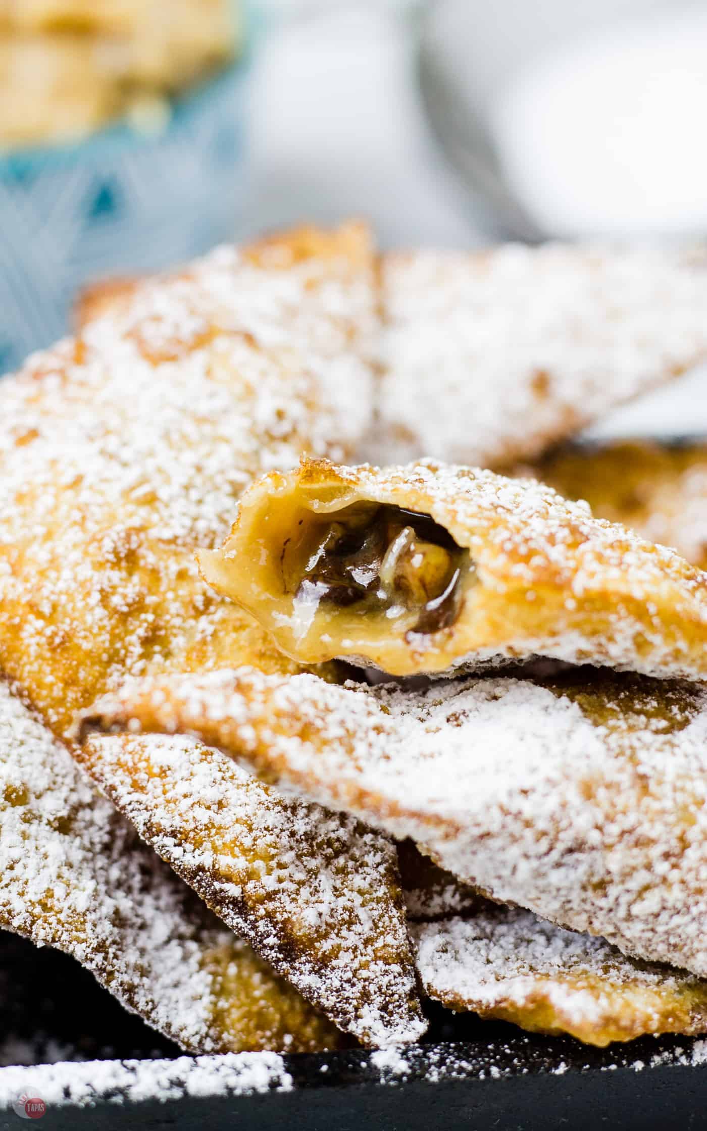 Close up of German chocolate wontons and one open so you can see the inside.
