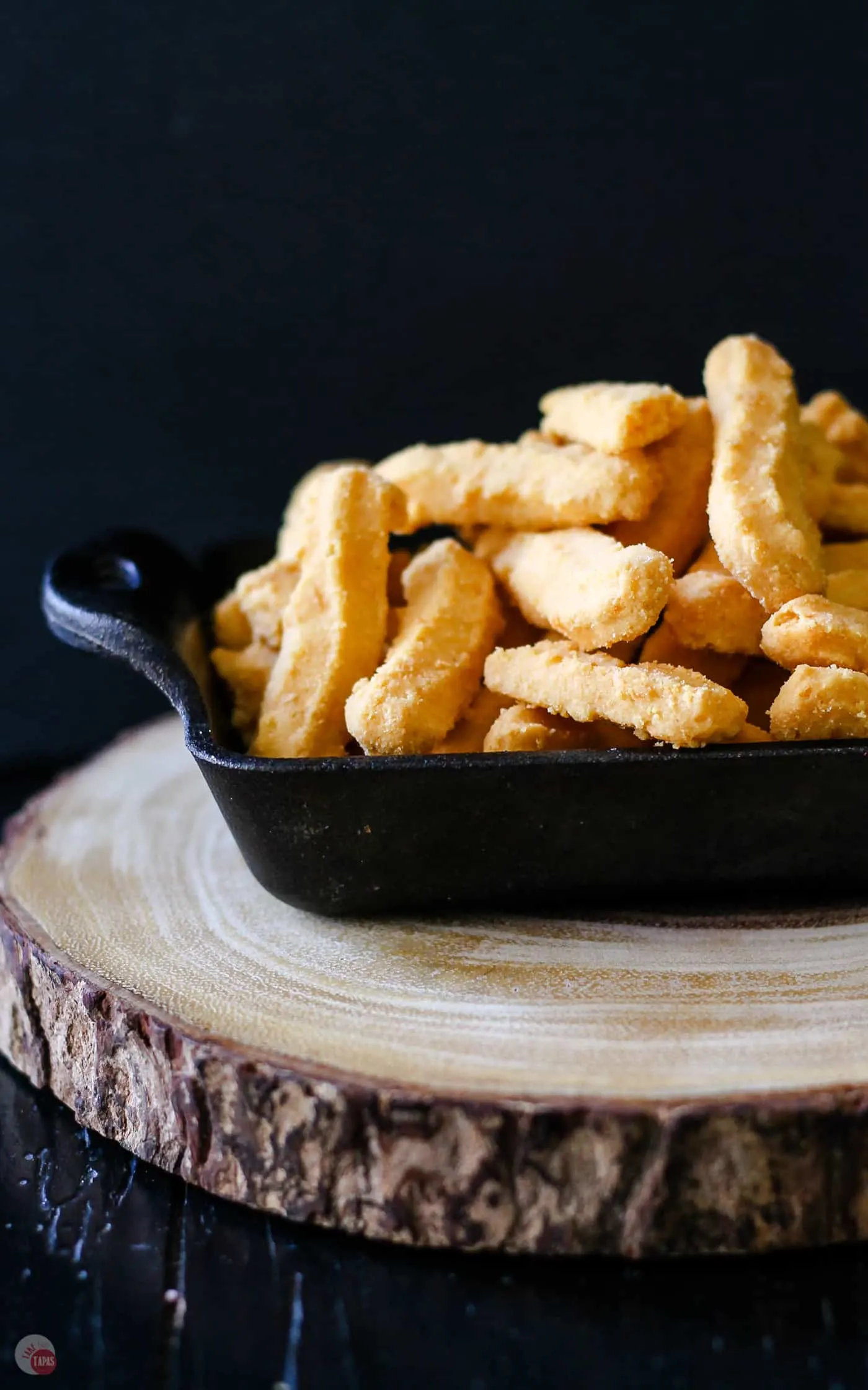 Crispy, spicy, flaky, and cheesy is the perfect combination for these addicting bites! Pimento Cheese Straws Recipe | Take Two Tapas | #pimentocheese #pimento #cheesestraws #recipe