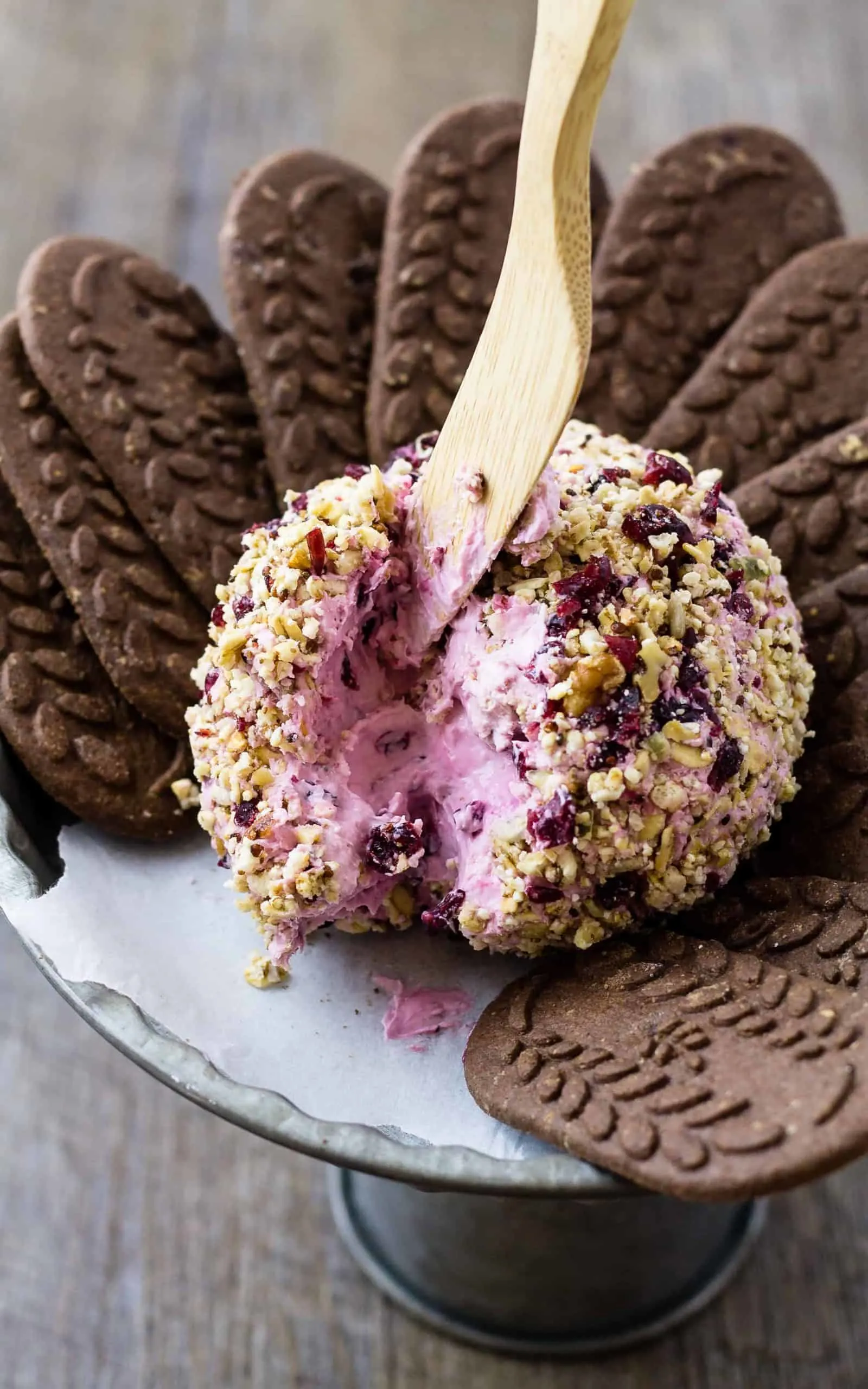 Blackberry Breakfast Cheese Ball with Granola and chocolate cookies on a platter