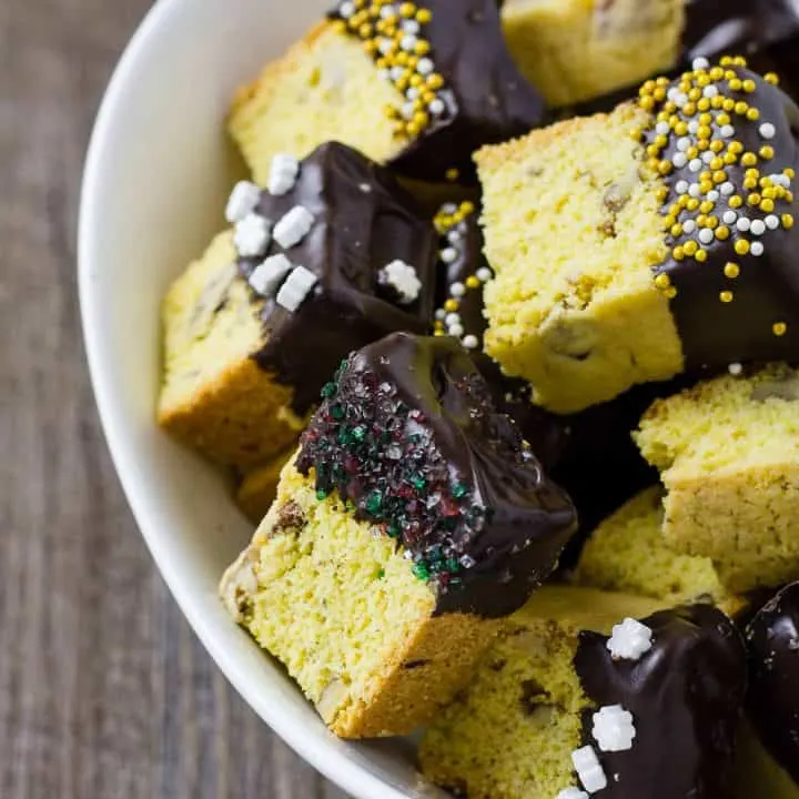 Cornmeal Biscotti Bites with Pecans and Chocolate in a white bowl